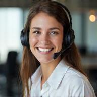Smiling operator assisting customer by phone (192x192)