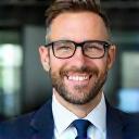 Tom Stevens smiling in office (128x128)